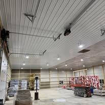 Second service bay with vehicle on lift